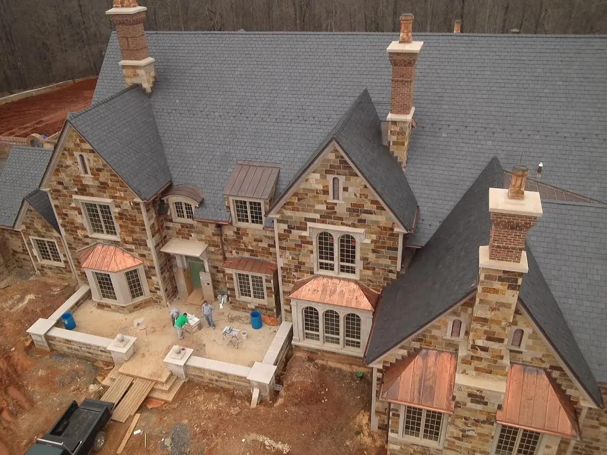 Craftsman Roofing Slate Roof Repair project in Newman